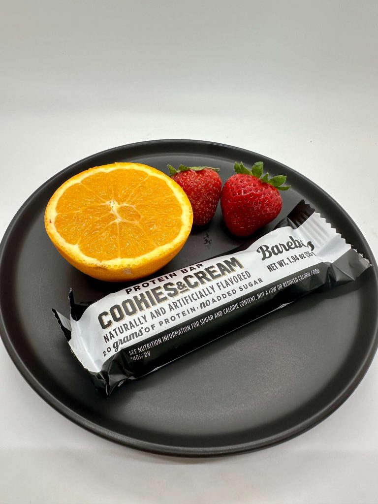 Barebells and strawberries and orange slices