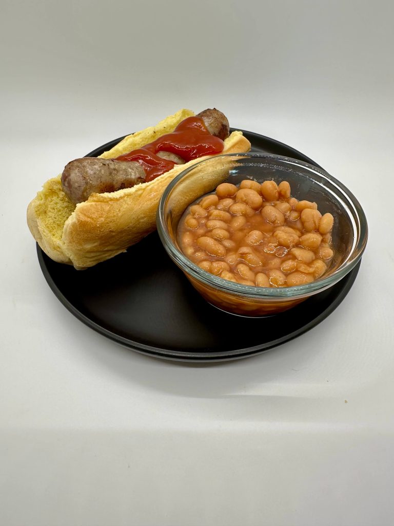 Brat on a bun with baked beans