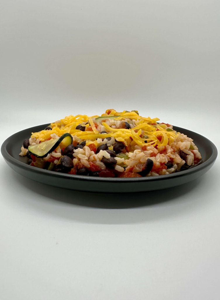 Zucchini, black bean, and rice skillet with cheese