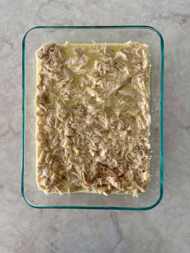 Shredded chicken in glass Pyrex dish